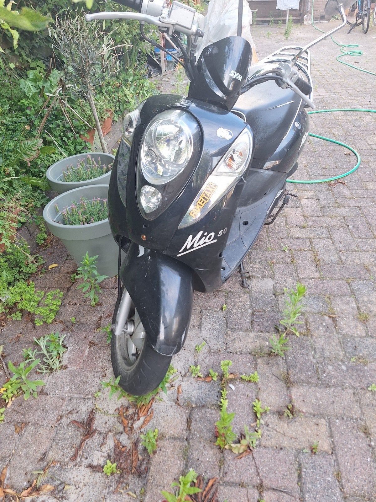 SYM Mio 2013 met geel kenteken – rijdt goed, Fietsen en Brommers, Scooters | SYM, Mio, Maximaal 45 km/u, Ophalen of Verzenden