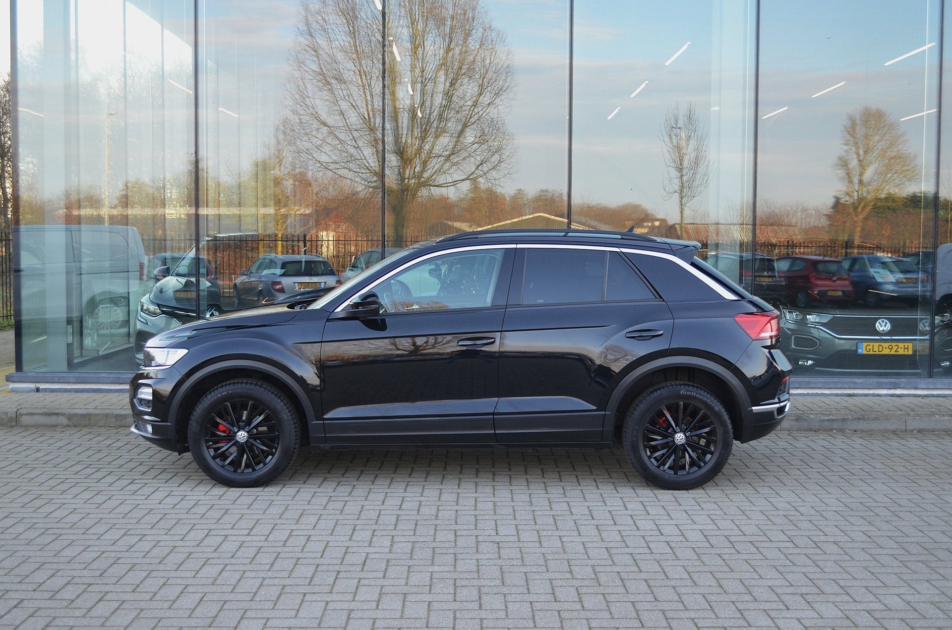Volkswagen T-ROC 1.5 TSI Sport | Automaat | Stoelverwarming, Auto's, Volkswagen, Stof, 4 cilinders, 150 pk, Zwart