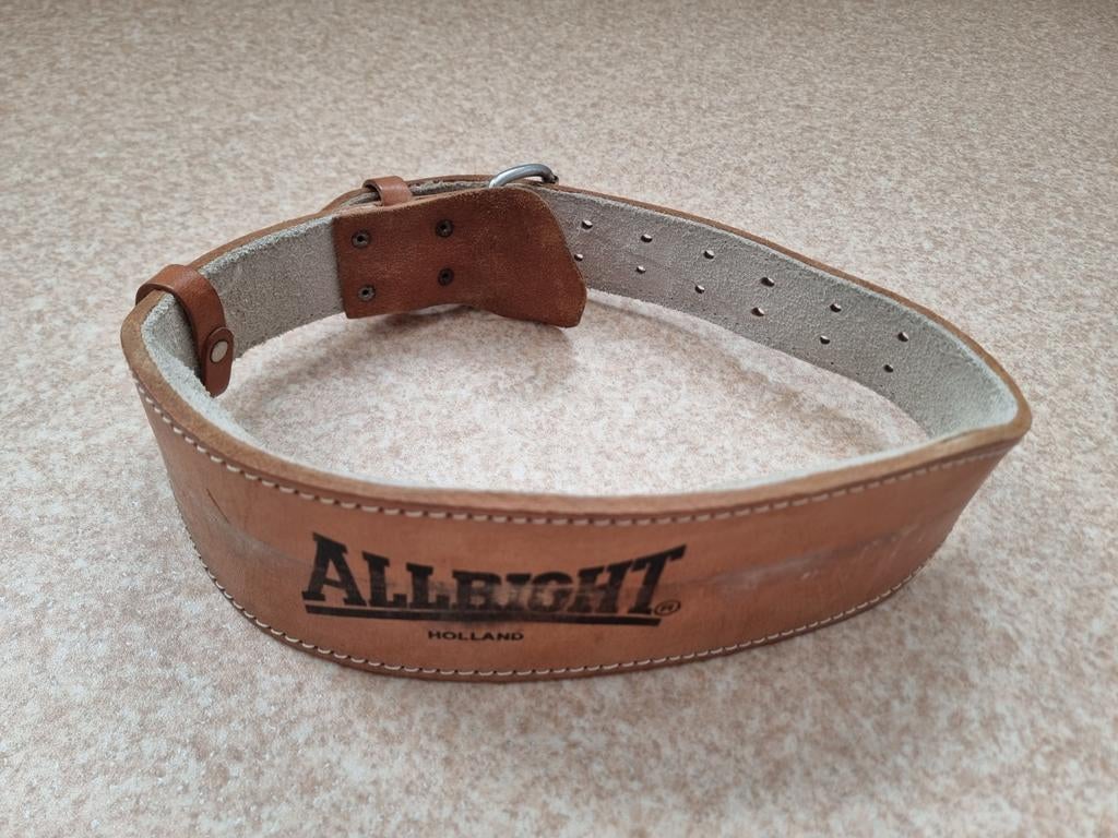 Leren riem voor kracht training., Ophalen