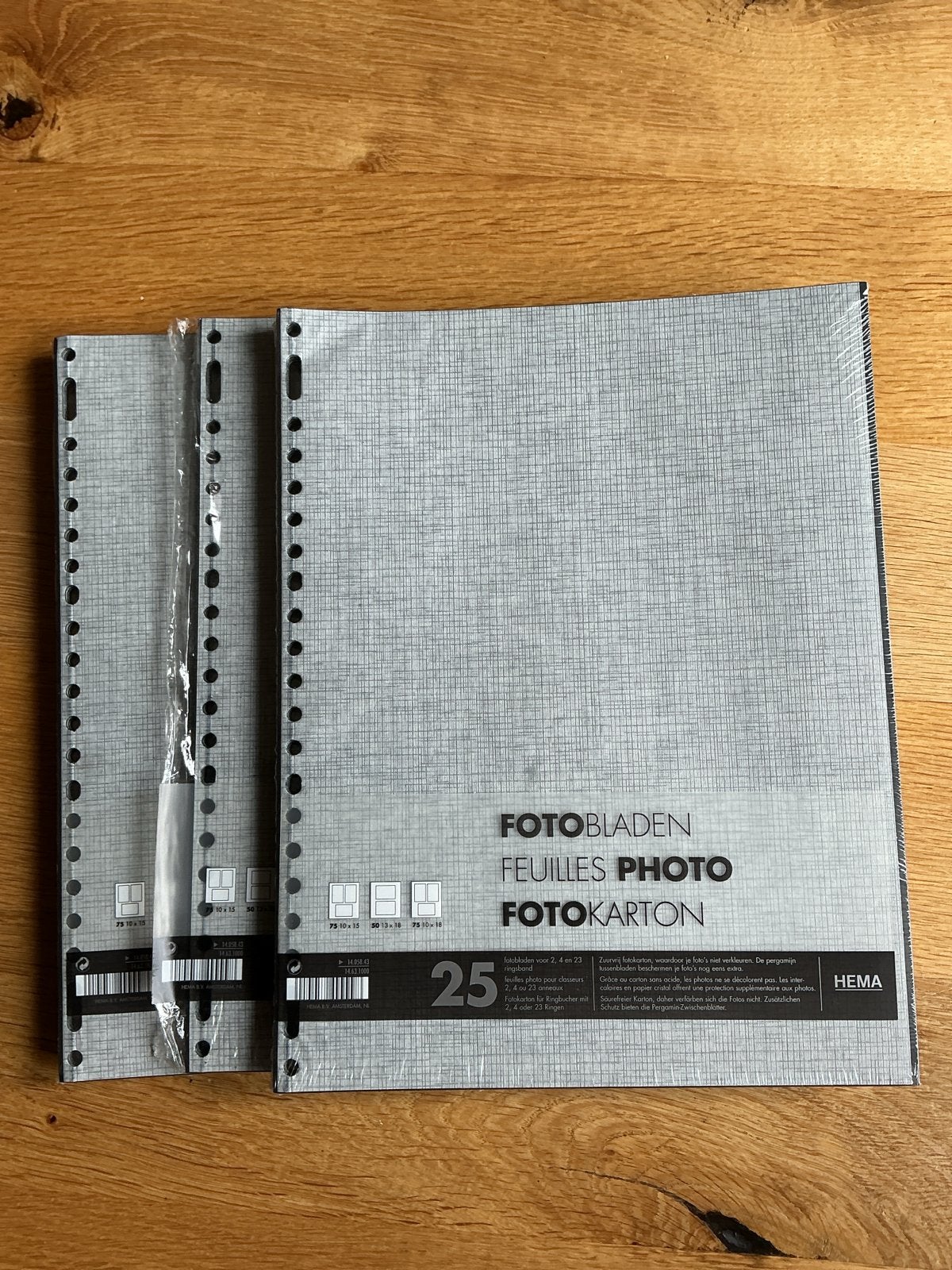 Hema Fotobladen Fotokarton - 25 stuks € 1,50 per pak, Grijs, Met pergamijn tussenbladen, Ophalen of Verzenden, Hema