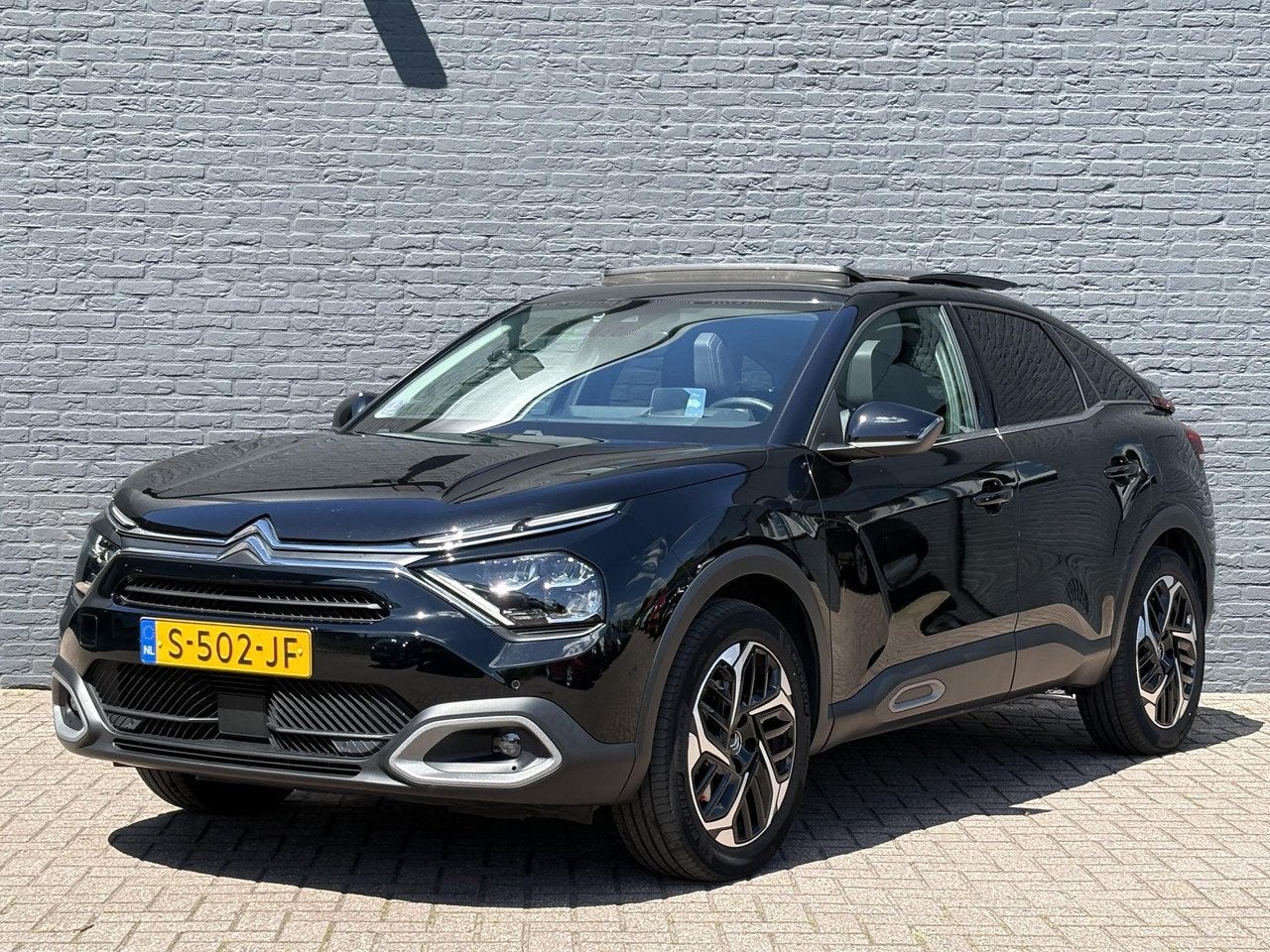 Citroën C4 1.2 Puretech Shine Pack Business AUTOMAAT | 1e E, Auto's, Automatische klimaatregeling, Gebruikt, 1199 cc, Zwart