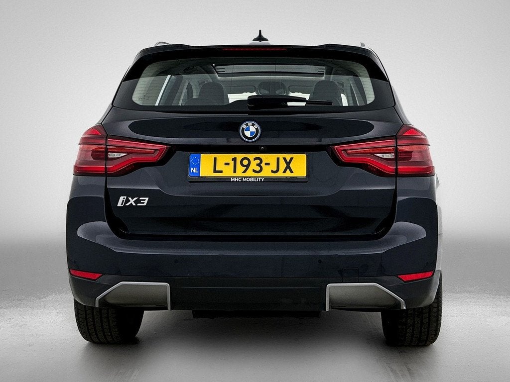 BMW iX3 Executive 80 kWh (bj 2021, automaat), Auto's, BMW, Automaat, Gebruikt, Leder en Stof, Zwart