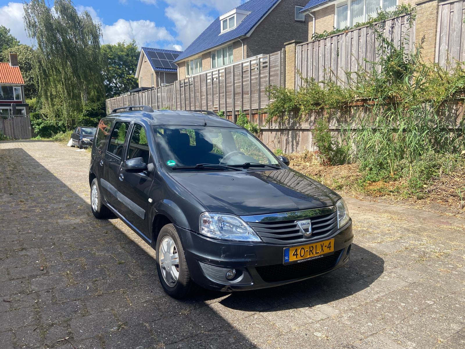 Dacia Logan MCV 1.6 – 1e eigenaar - APK juli 2027 - Grijs, Auto's, Voorwielaandrijving, 4 cilinders, Logan, Stationwagon