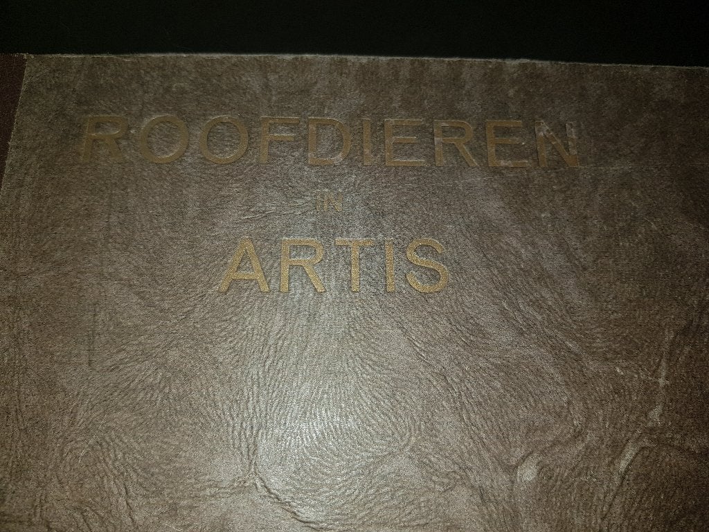 Artis roofdieren fotoboek, Ophalen of Verzenden, Gelezen, Diverse auteurs, Plaatjesalbum