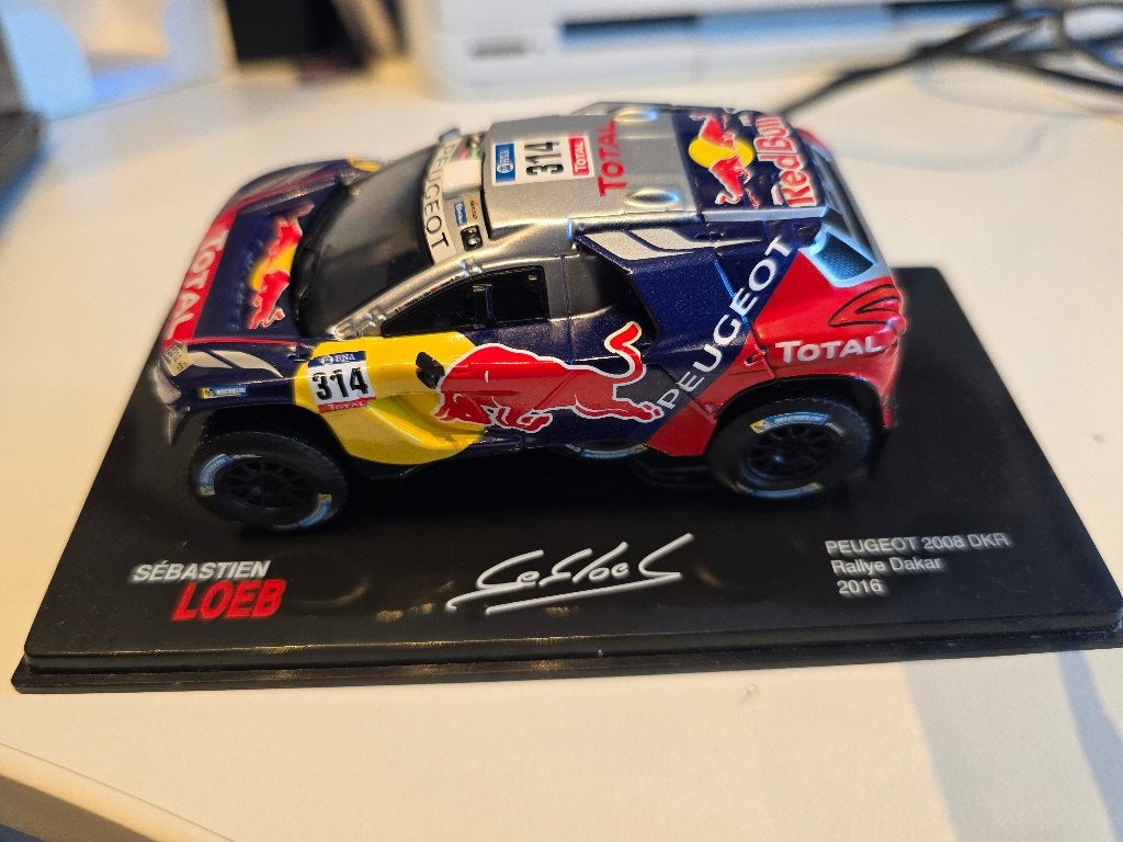 Peugeot 2008 DKR Rallye Dakar 2016 1/43, Ophalen of Verzenden, Zo goed als nieuw, Auto, Overige merken