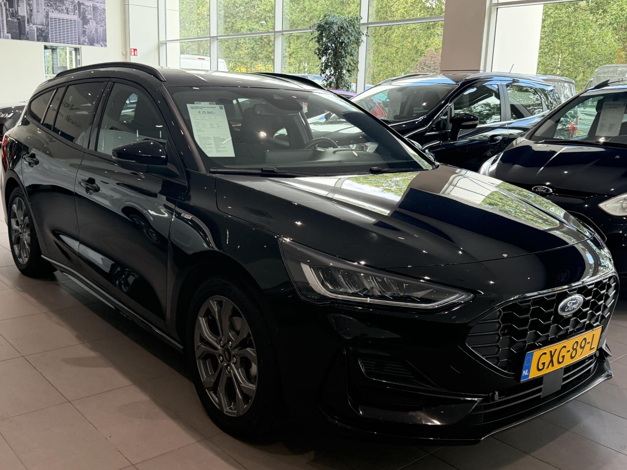 Ford Focus Wagon 1.0 EcoBoost Hybrid ST Line navigatie | app, Auto's, 12 maanden, Gebruikt, Zwart, Origineel Nederlands