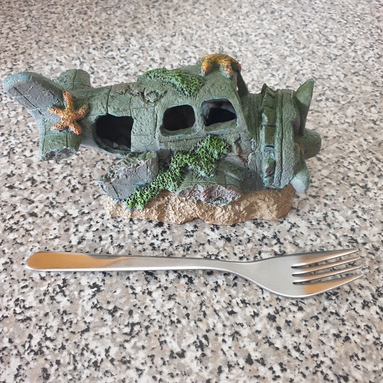 aquarium ornament kunststof, Ophalen