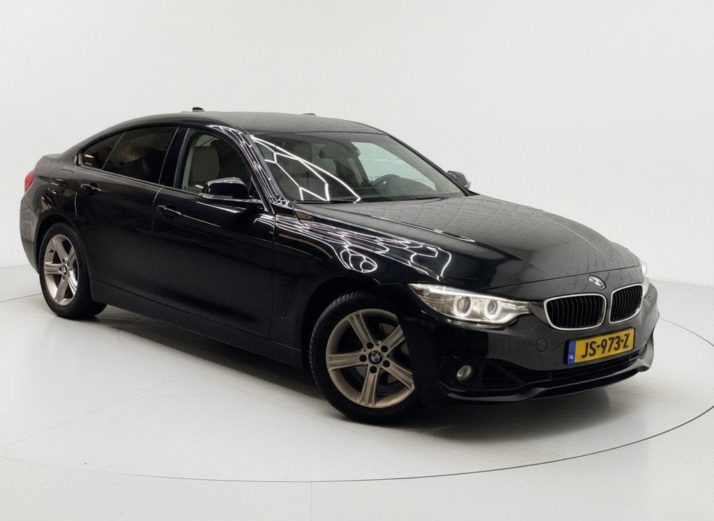 BMW 4-serie Gran Coupé 418i Centennial High Executive NAP, Gebruikt, Zwart, 19 km/l, 3 cilinders