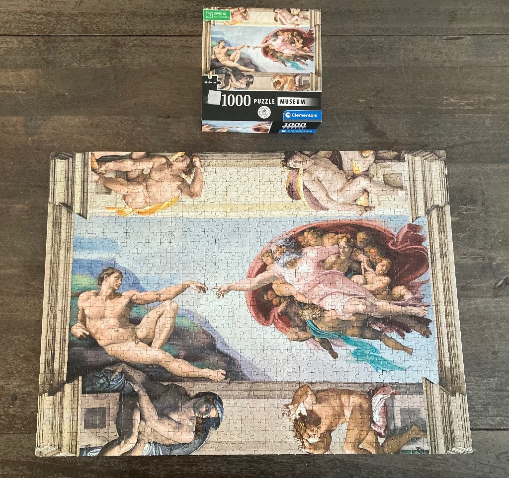Clementoni puzzel 1000st - Michelangelo The creation of Man, Ophalen of Verzenden, 500 t/m 1500 stukjes, Zo goed als nieuw, Legpuzzel