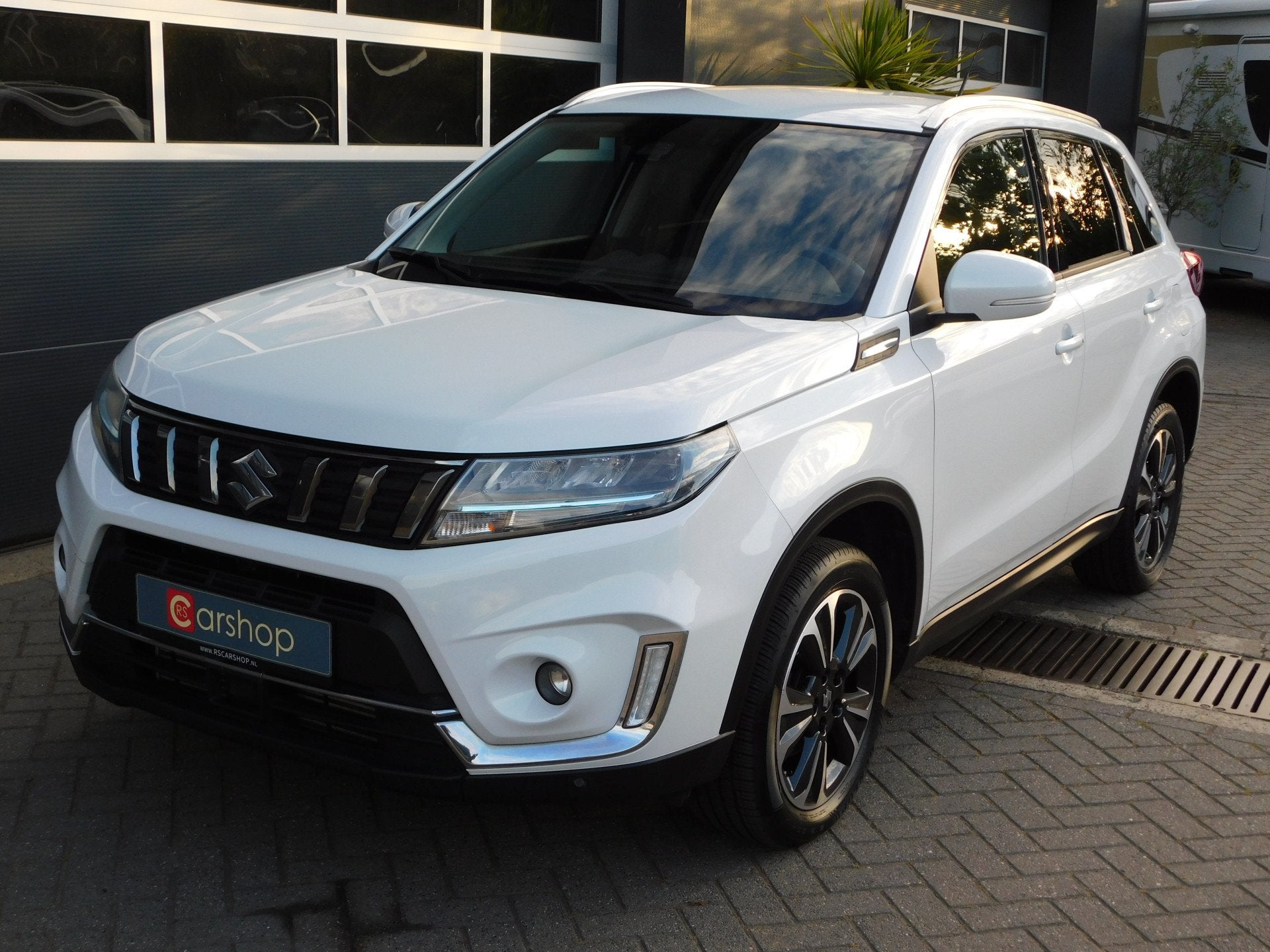 Suzuki Vitara 1.4 Boosterjet Style Smart Hybrid (bj 2021), 12 maanden, Gebruikt, Euro 6, 4 cilinders