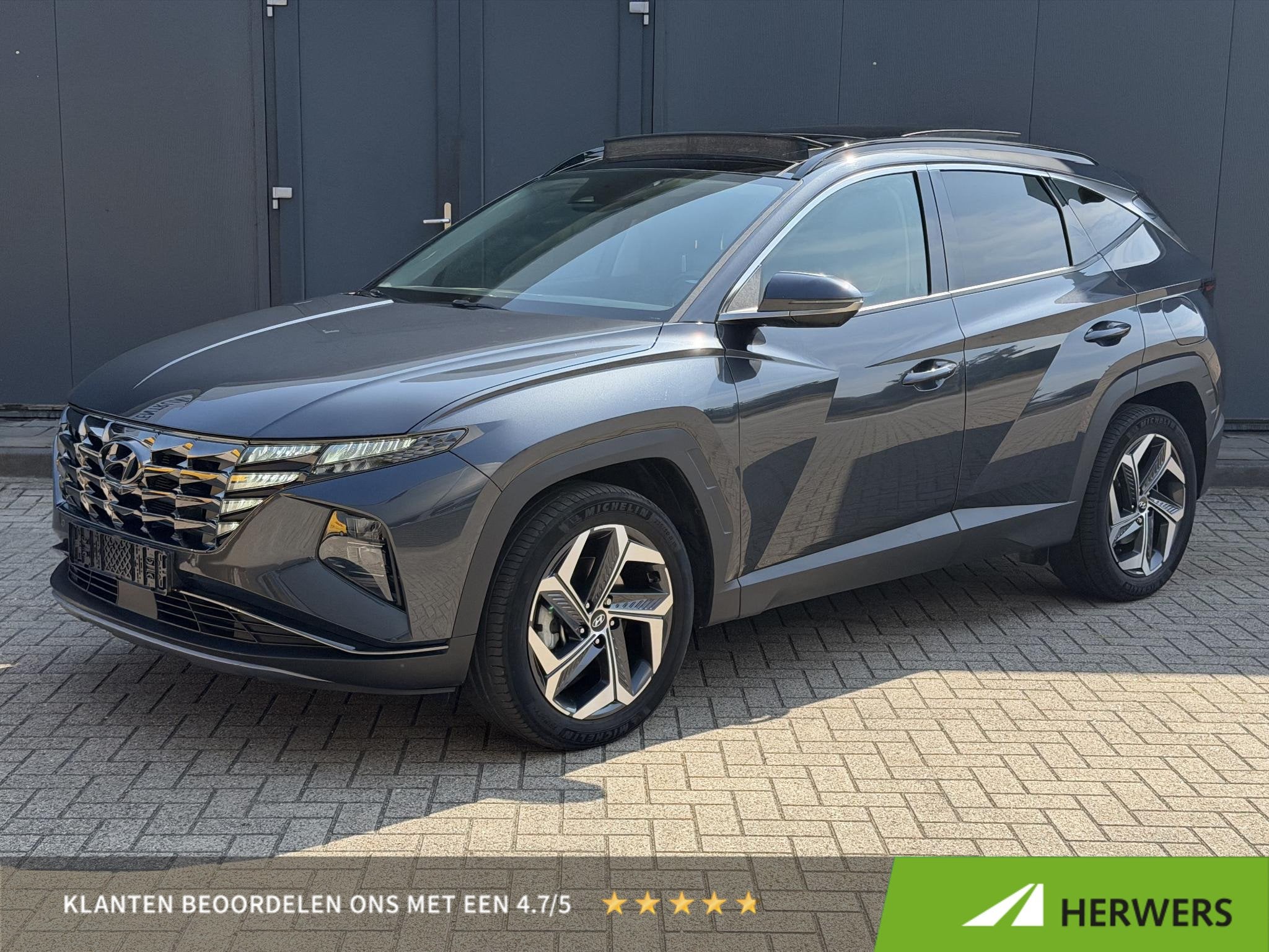 Hyundai Tucson 1.6 T-GDI HEV 230pk Premium Sky / Schuif Kant, Auto's, Gebruikt, Euro 6, 4 cilinders, 1650 kg