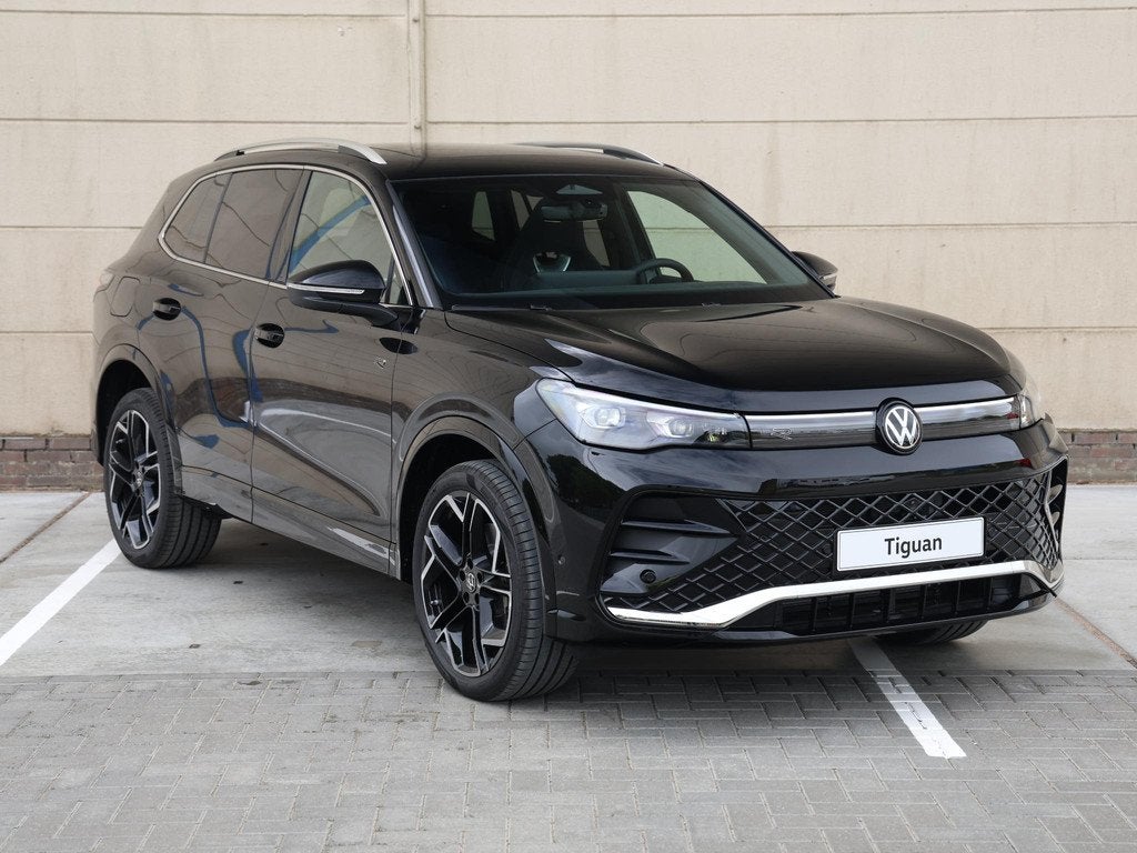 Volkswagen Tiguan R-Line Edition 1.5 eHybrid 272 PK | Naviga, Auto's, Volkswagen, Stof, 1498 cc, 4 cilinders, 2000 kg