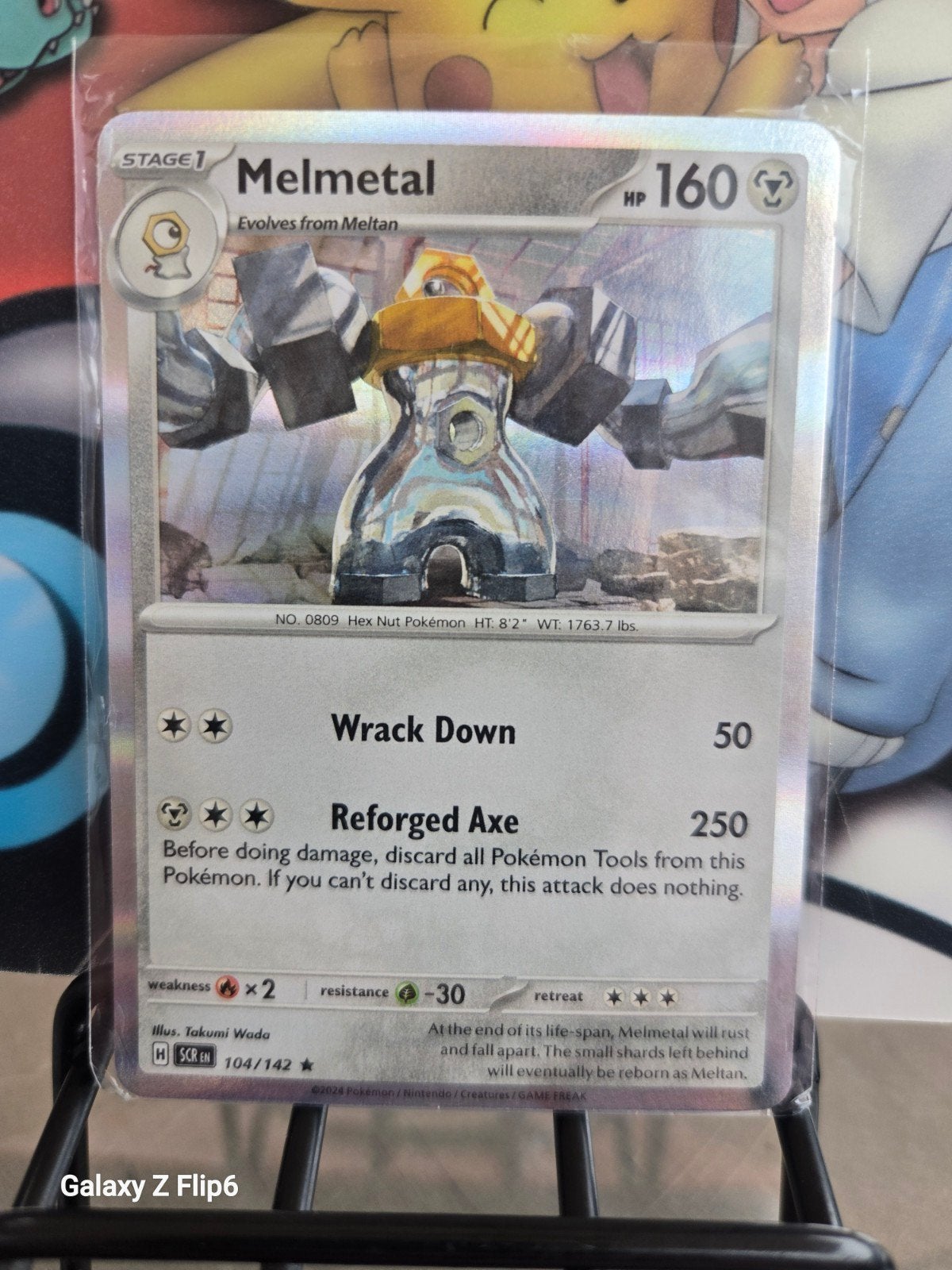 Pokémon Kaart: Melmetal 104/142 (Foil), Ophalen of Verzenden, Zo goed als nieuw, Losse kaart, Foil