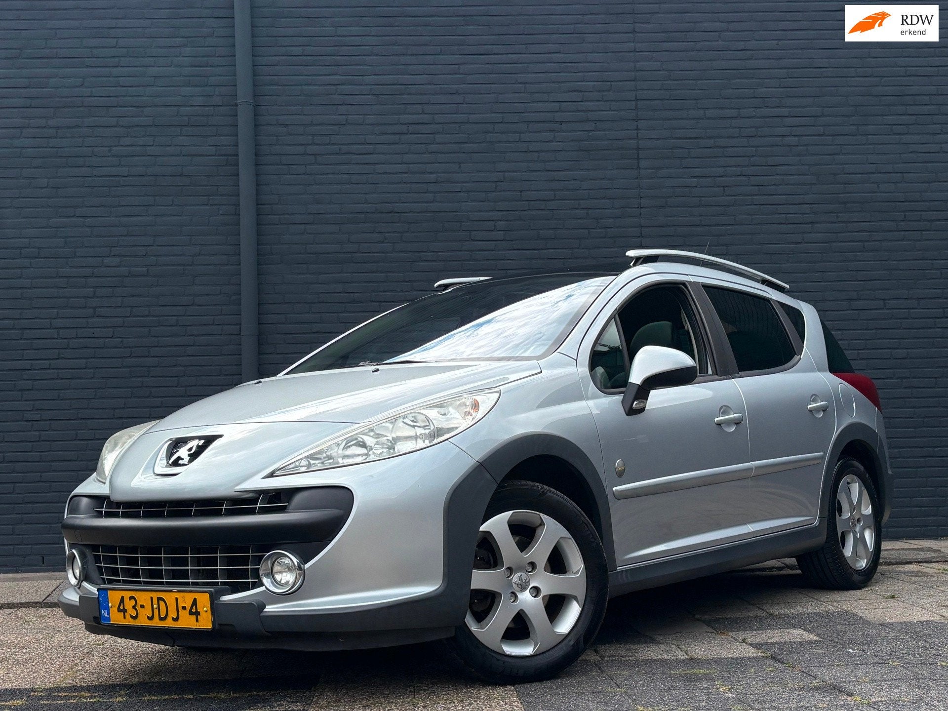 Peugeot 207 SW Outdoor 1.6 VTi XS | Cruise | Airco | Trekhaa, Auto's, Gebruikt, 4 cilinders, 1110 kg, Origineel Nederlands