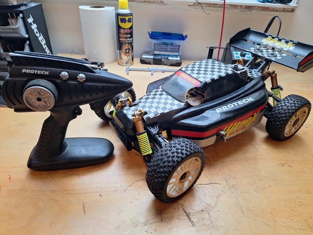 Protech Ultrex Evo 1/8 Nitro Buggy - Oudje, weinig gebruikt, Ophalen of Verzenden