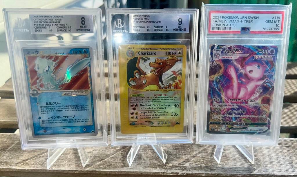 Pokémon Charizard skyridge. Mew Goldstar. Mew vmax, Ophalen of Verzenden, Zo goed als nieuw, Losse kaart, Foil