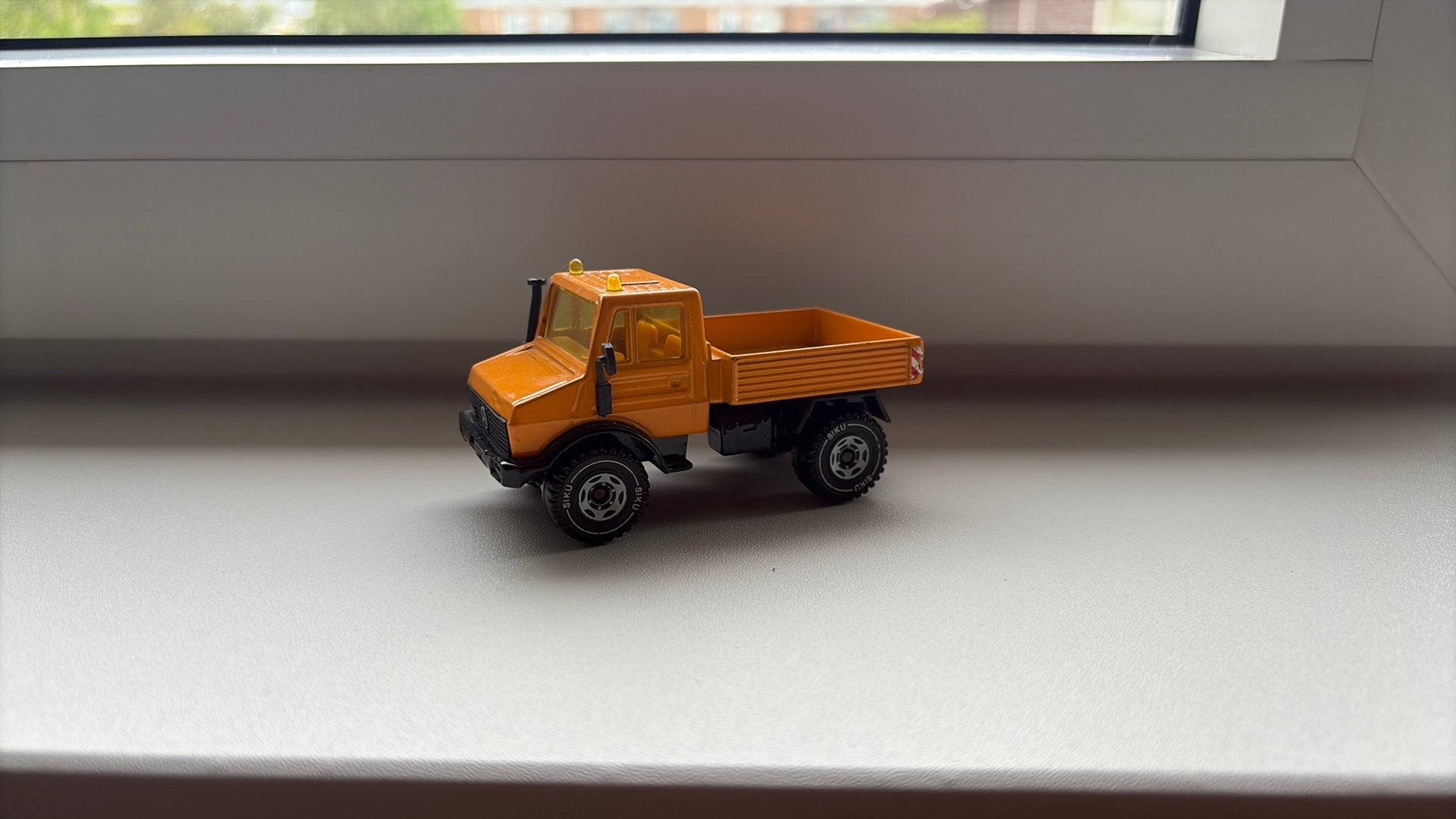 Unimog u 1500 oranje, Ophalen of Verzenden, Gebruikt, Hijskraan, Tractor of Landbouw, SIKU