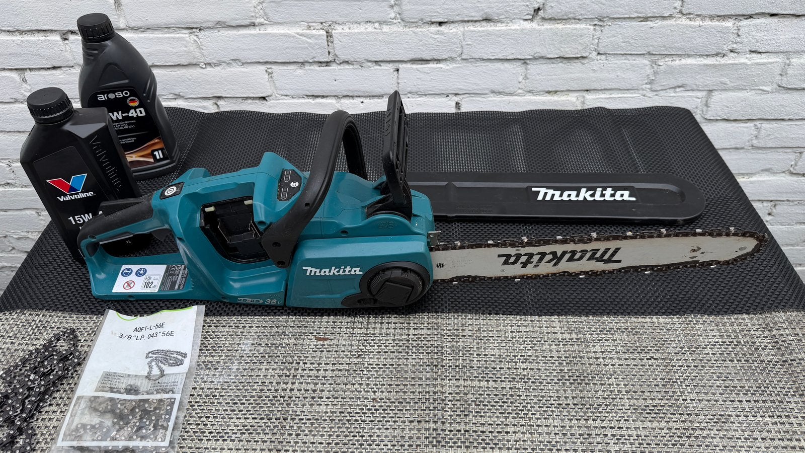 Makita accu kettingzaag.Duc 400., Ophalen, Gebruikt, Accu