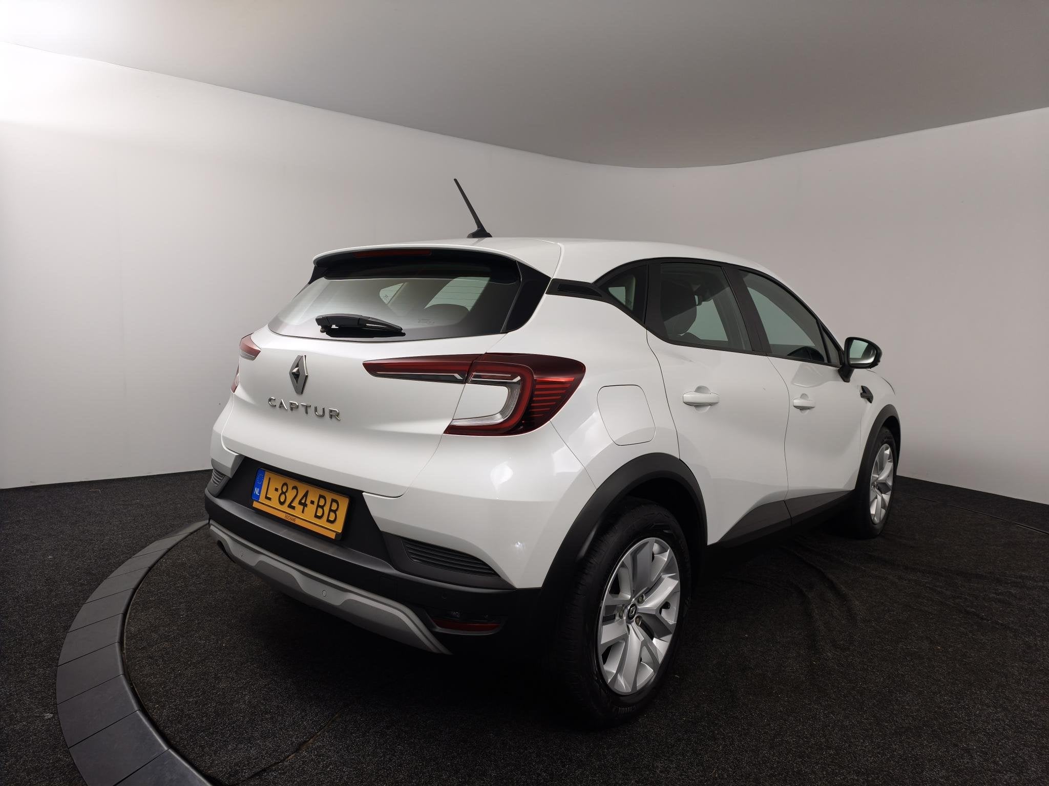 Renault Captur 1.0 TCe 90 Business Zen | Navigatie | Camera, Auto's, Stof, Gebruikt, Met garantie (alle), 635 kg