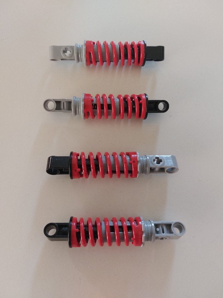 4 technic Lego schokdemper 9L, Lego, Ophalen of Verzenden, Zo goed als nieuw, Technic