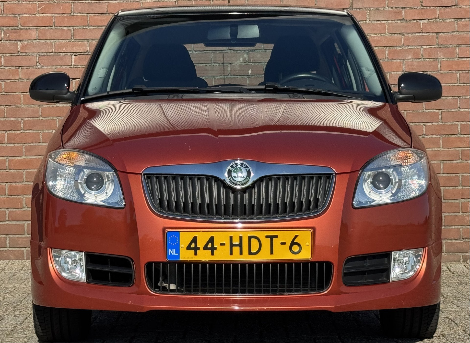 Skoda Fabia 1.4-16V SPORT | NL-AUTO! | 1E EIGENAAR!, Auto's, Voorwielaandrijving, Zwart, Verwarmde buitenspiegels, Origineel Nederlands