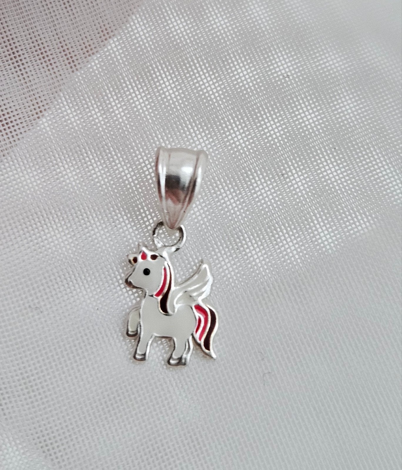 Sterling zilveren eenhoorn kettinghangertje, Sieraden, Tassen en Uiterlijk, Kindersieraden, Ophalen of Verzenden, Zo goed als nieuw