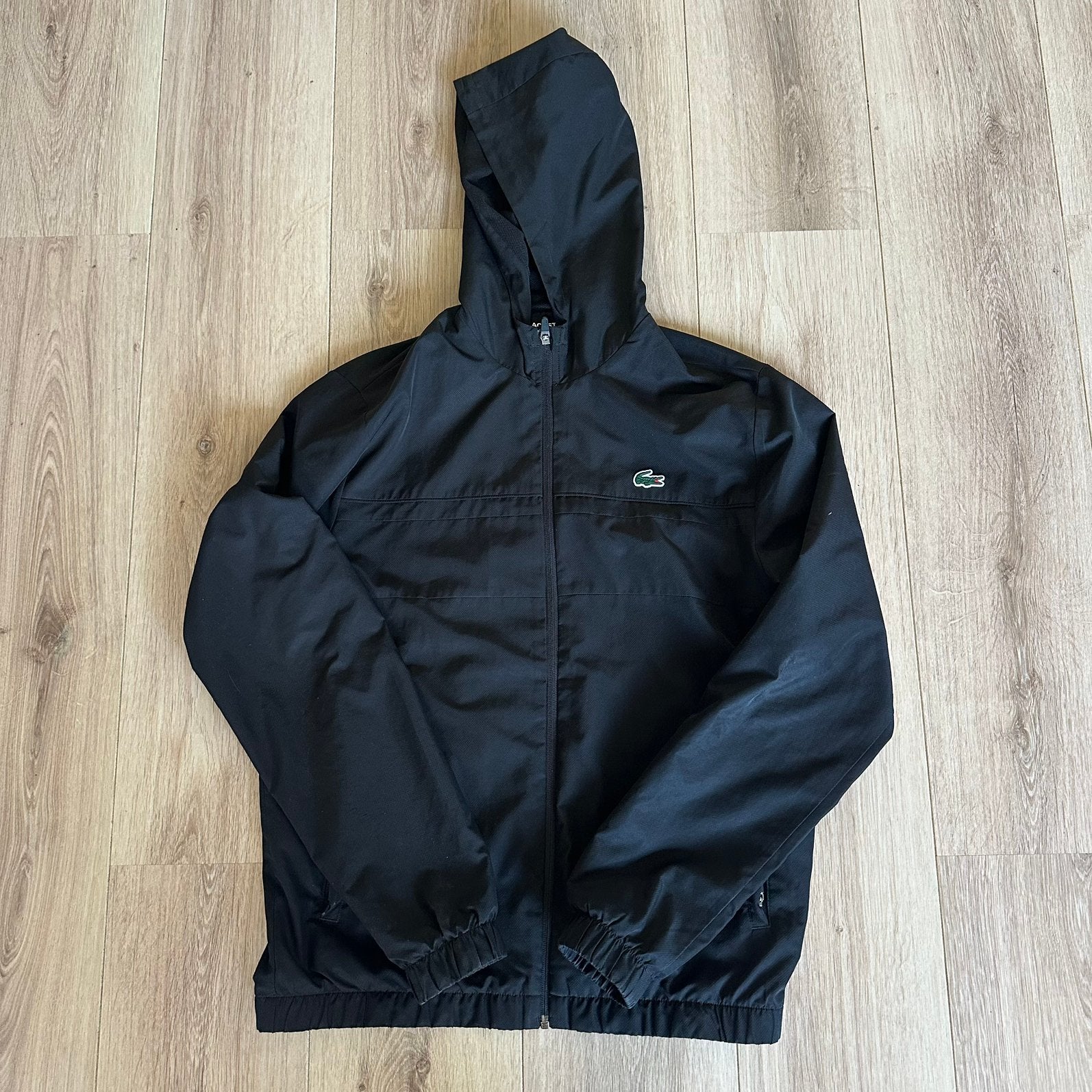 Lacoste Windbreaker/Zomerjas, Ophalen of Verzenden, Zo goed als nieuw, Maat 48/50 (M), Zwart