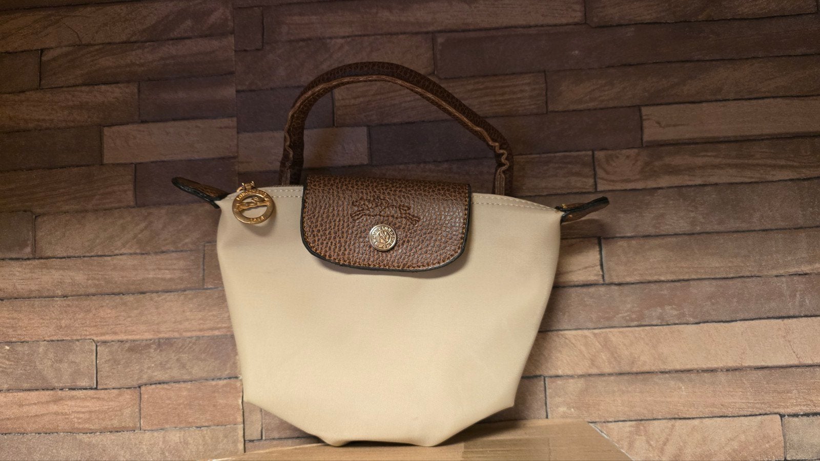 Longchamp Le Pliage Mini Handtas Beige/Bruin, Sieraden, Tassen en Uiterlijk, Tassen | Damestassen, Ophalen of Verzenden, Gebruikt