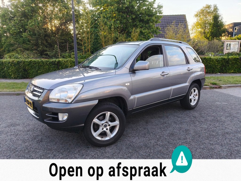 Kia Sportage 2.0 CVVT Comfort Airco|Cruise|Winterset|APK, Auto's, Kia, 1442 kg, Gebruikt, 4 cilinders, Leder en Stof