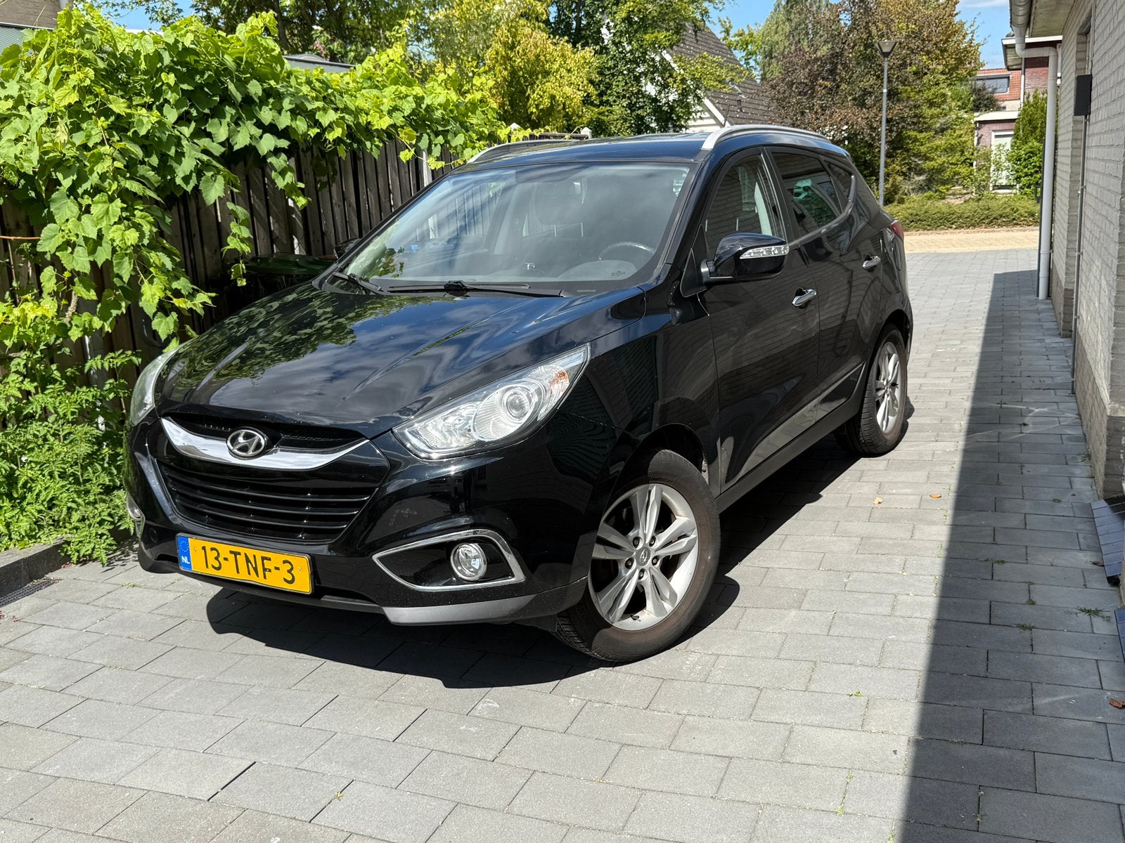 Hyundai iX35 2.0i Cvvt 163pk 2012 nieuw APK, Zwart, 4 cilinders, Leder en Stof, 75 €/maand