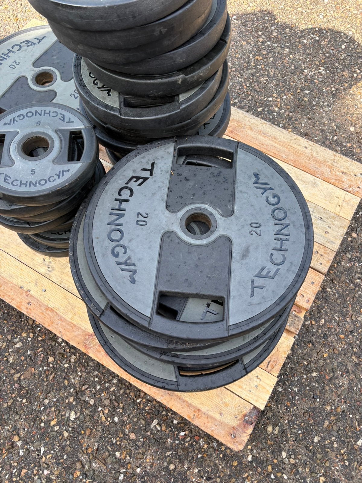 1000 kg technogym pu urethane olympische halter schijven, Sport en Fitness, Halterschijven, Pu urethane, Gebruikt, Technogym