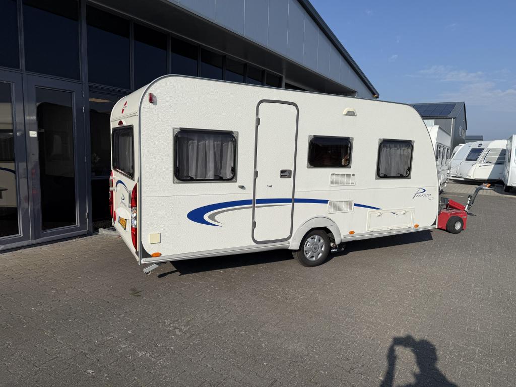 Bürstner Premio 435 TS Bed + Zit + WC + Mover 840KG, Caravans en Kamperen, Bedrijf, Treinzit, Bürstner, 4 tot 5 meter