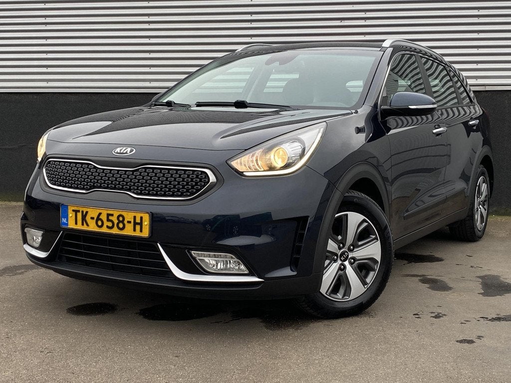 Kia Niro 1.6 GDi Hybrid DynamicLine NL-auto boekjes compleet, Auto's, Kia, Gebruikt, Euro 6, 2 kWh, Blauw