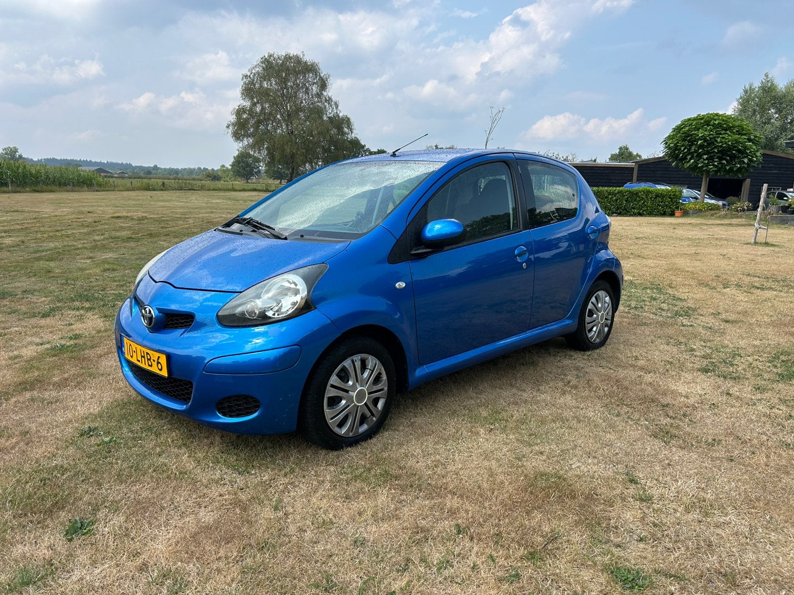 Toyota Aygo 1.0 12V Vvt-i 5DRS Automaat  2010 Blauw Nwe Apk, Auto's, Euro 5, Stof, Metallic lak, 68 pk