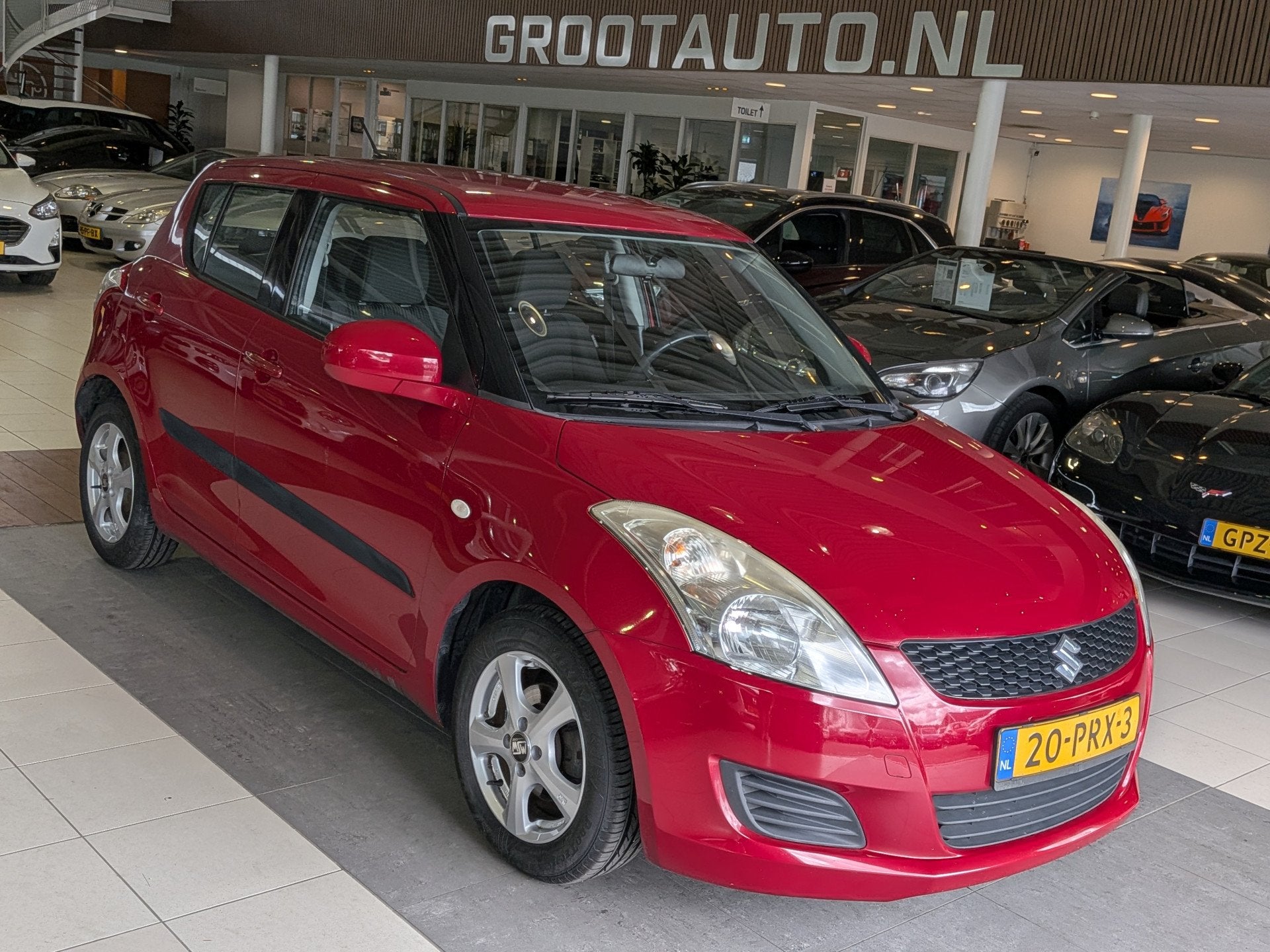 Suzuki Swift 1.2 Comfort EASSS Airco, Stoelverwarming, Stuur, Auto's, Voorwielaandrijving, Stof, Gebruikt, 4 cilinders