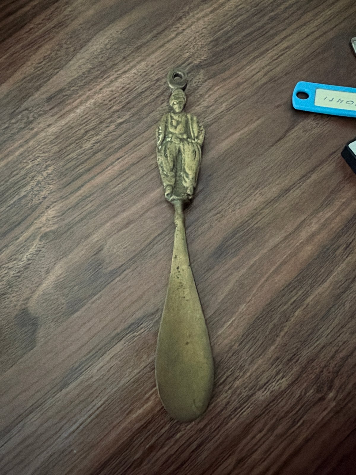 Antieke messing schoenlepel met figuur, Ophalen