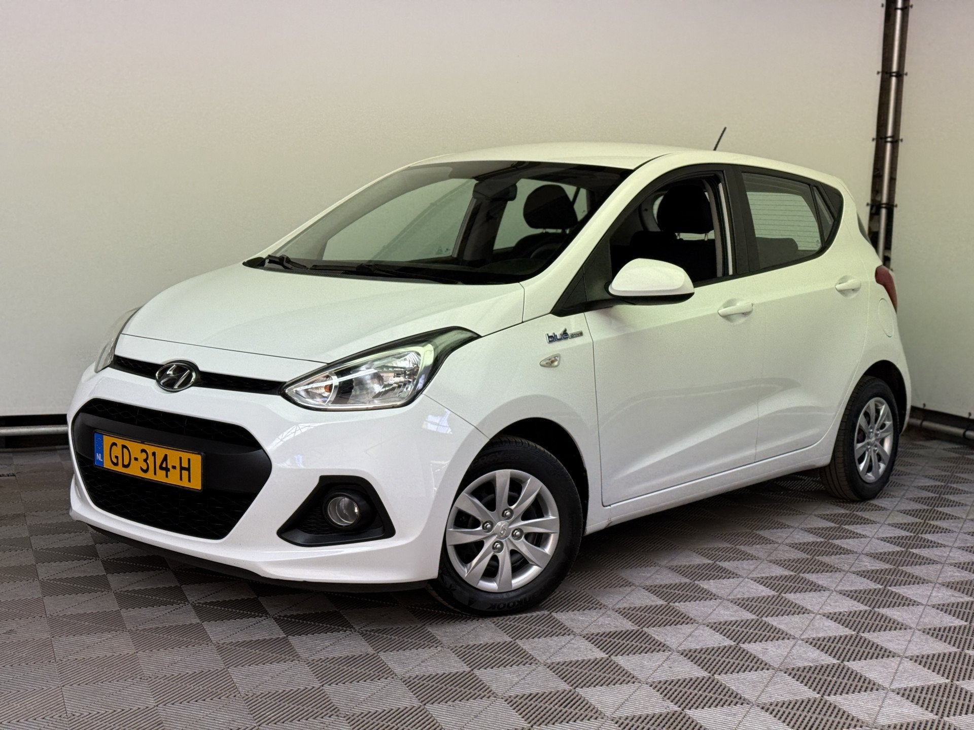 Hyundai i10 1.0i i-Motion Comfort ECC Cruise 1e Eigenaar NL, Auto's, Voorwielaandrijving, Euro 5, Stof, Gebruikt
