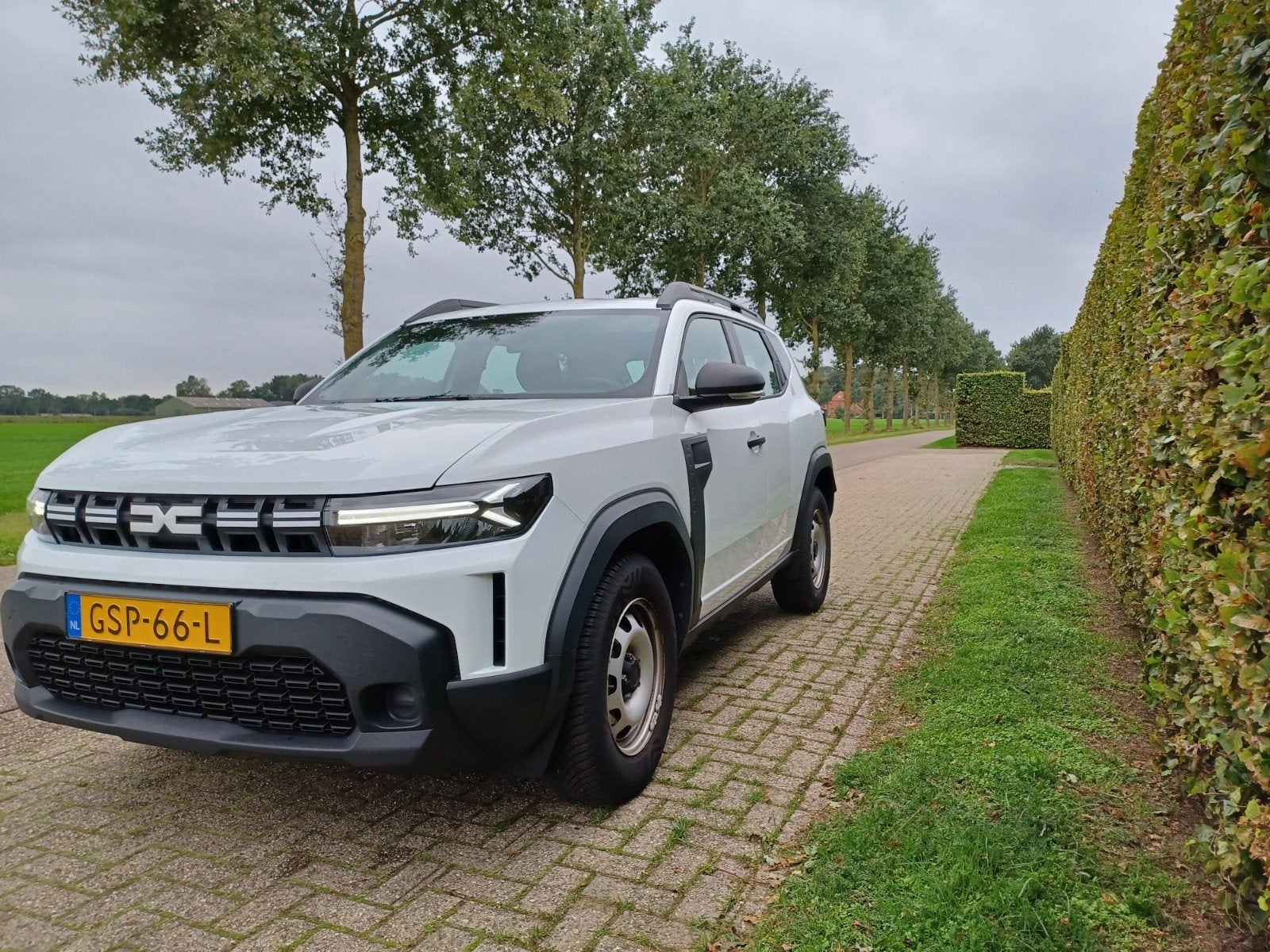 Dacia Duster 1.0 Tce 100pk Bi-fuel GPF 2024 Wit, Auto's, Duster, 100 pk, Wit, Origineel Nederlands