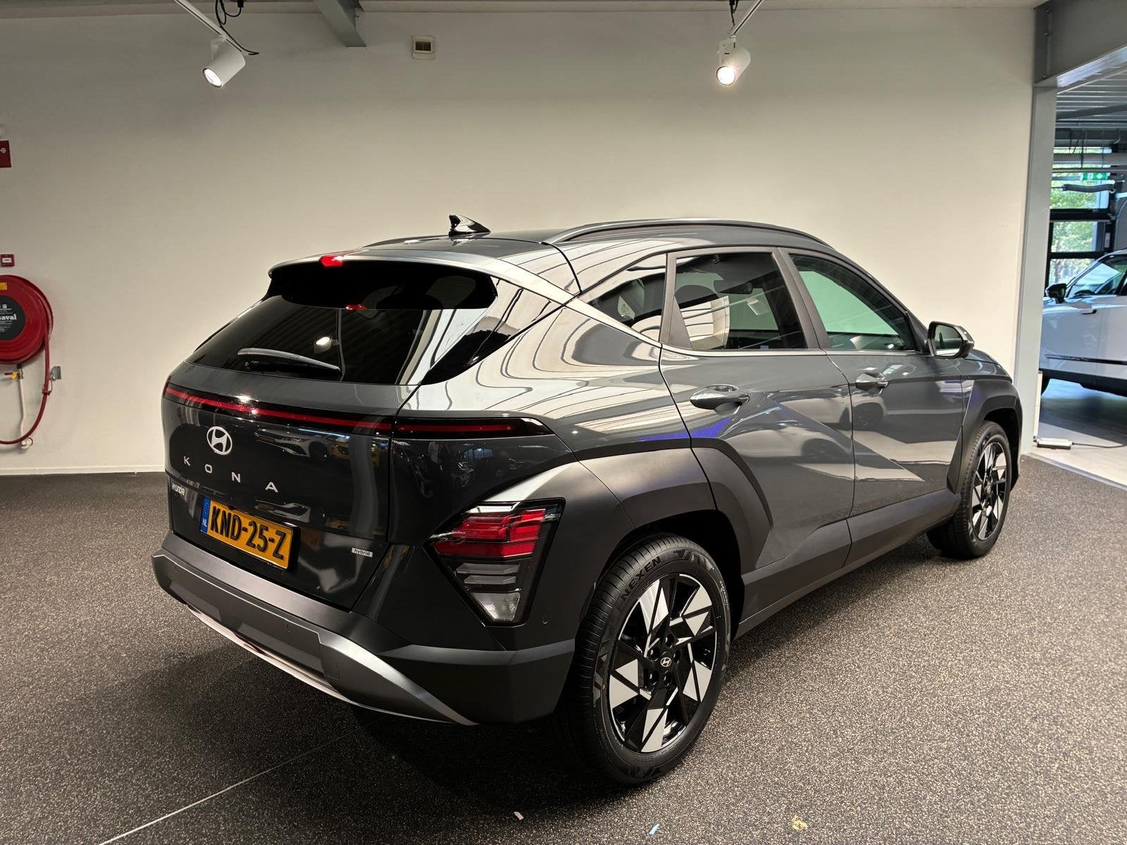 Hyundai Kona 1.6 GDI HEV Premium Sky | Panoramadak | Elektri, Auto's, Gebruikt, SUV of Terreinwagen, 1300 kg, Volledig hybride