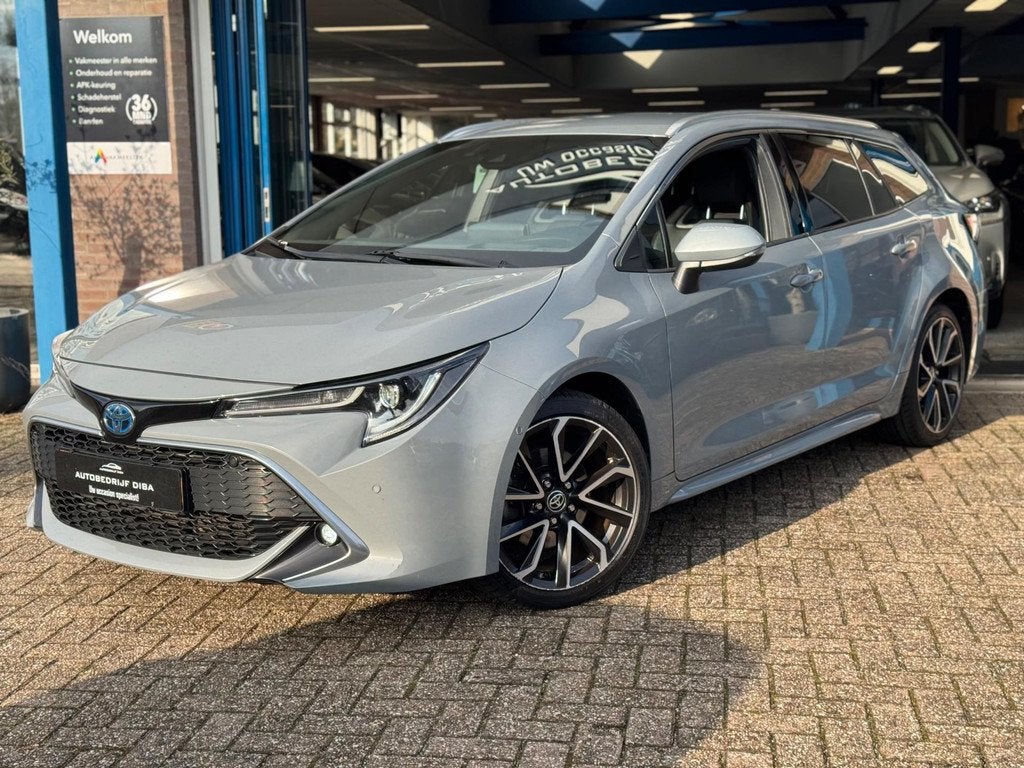 Toyota Corolla Touring Sports 2.0 Hybrid Executive AUT NAP!, Auto's, Toyota, 1345 kg, 450 kg, Gebruikt, 4 cilinders