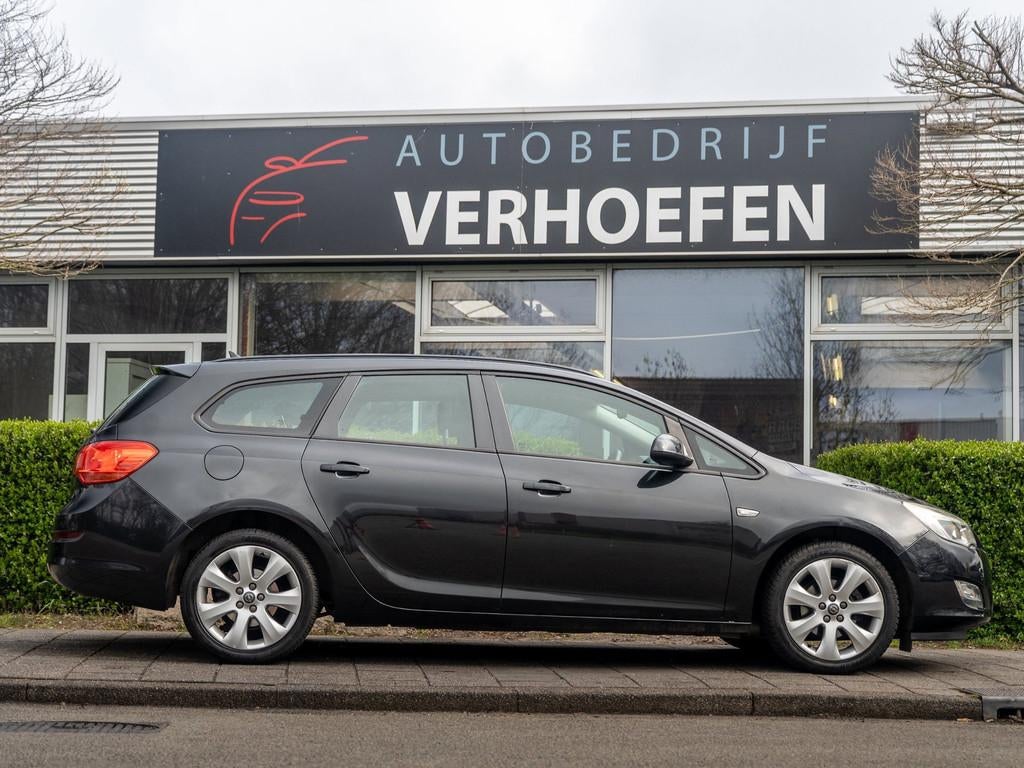 Opel Astra Sports Tourer 1.4 Edition - AIRCO - CRUISE / CLIM, Voorwielaandrijving, Euro 5, Gebruikt, 4 cilinders