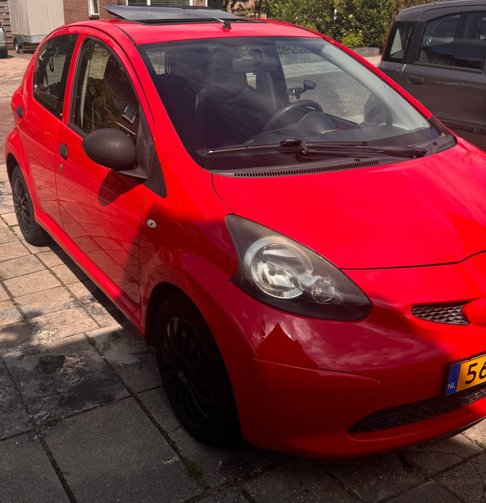 Toyota Aygo 1.0 12V Vvt-i 5DRS 2007 Rood, Auto's, Voorwielaandrijving, 4 stoelen, 68 pk, Origineel Nederlands