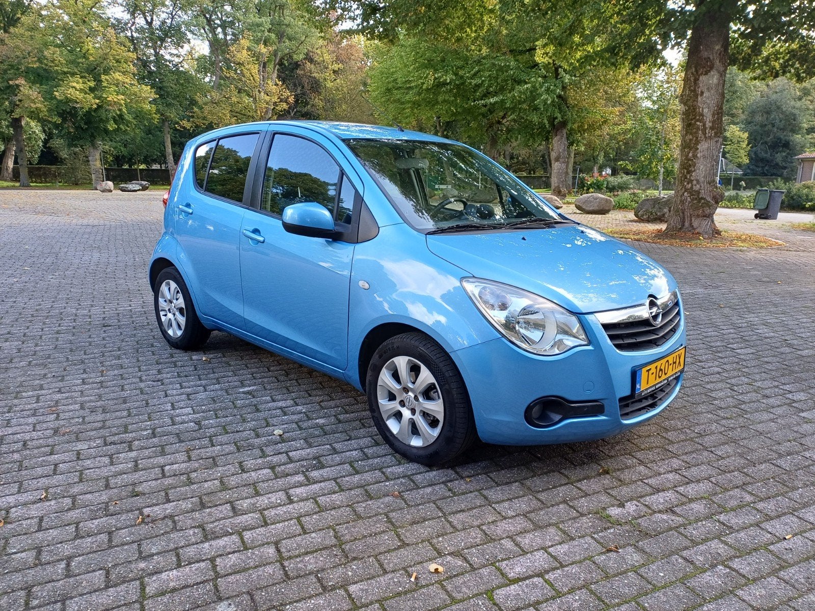 Opel Agila 1.0 12V 2009 Blauw, Auto's, Stof, 31 €/maand, Blauw, 996 cc