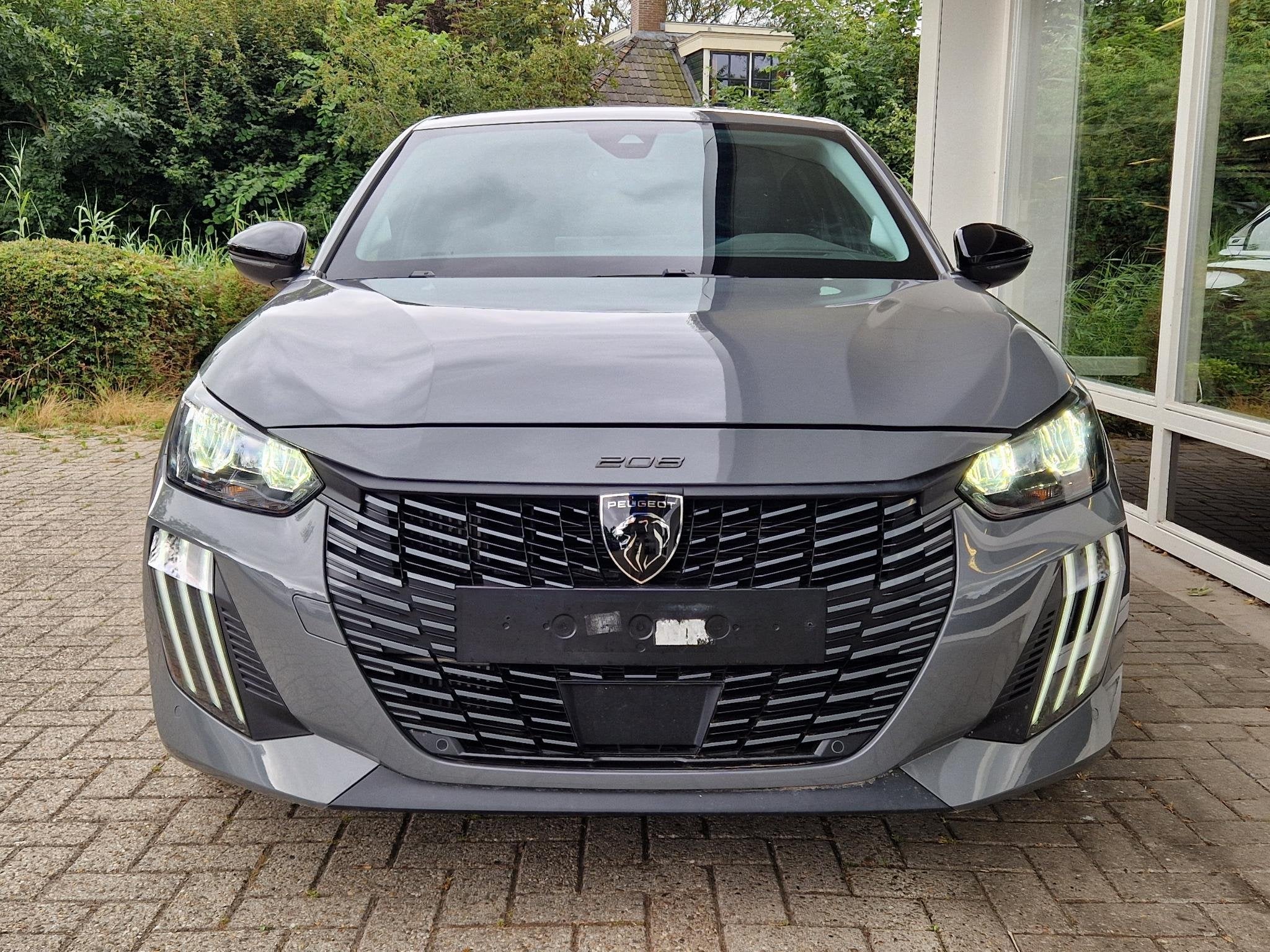 Peugeot 208 1.2 Hybrid 100 e-DCS6 Allure | Climate & Cruise, Auto's, Voorwielaandrijving, 1199 cc, Leder en Stof, Handgeschakeld