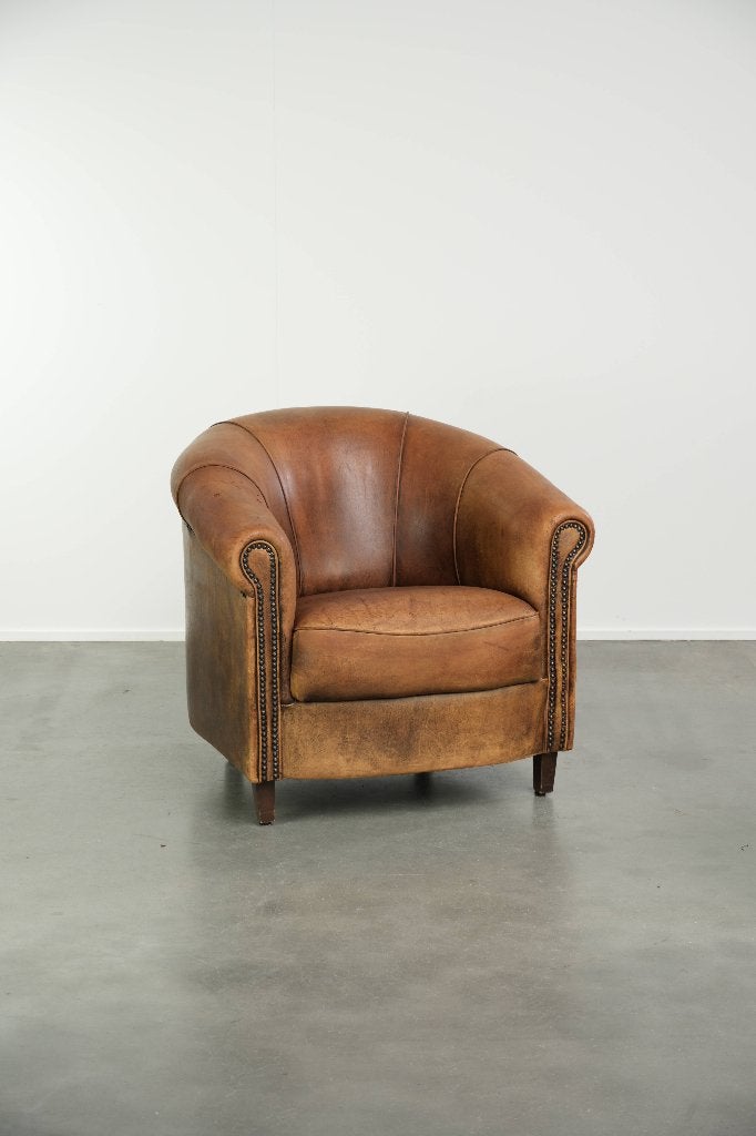 Vintage schapenleren clubfauteuil in een mooie cognac kleur, Huis en Inrichting, Ophalen, Gebruikt, Vintage, /