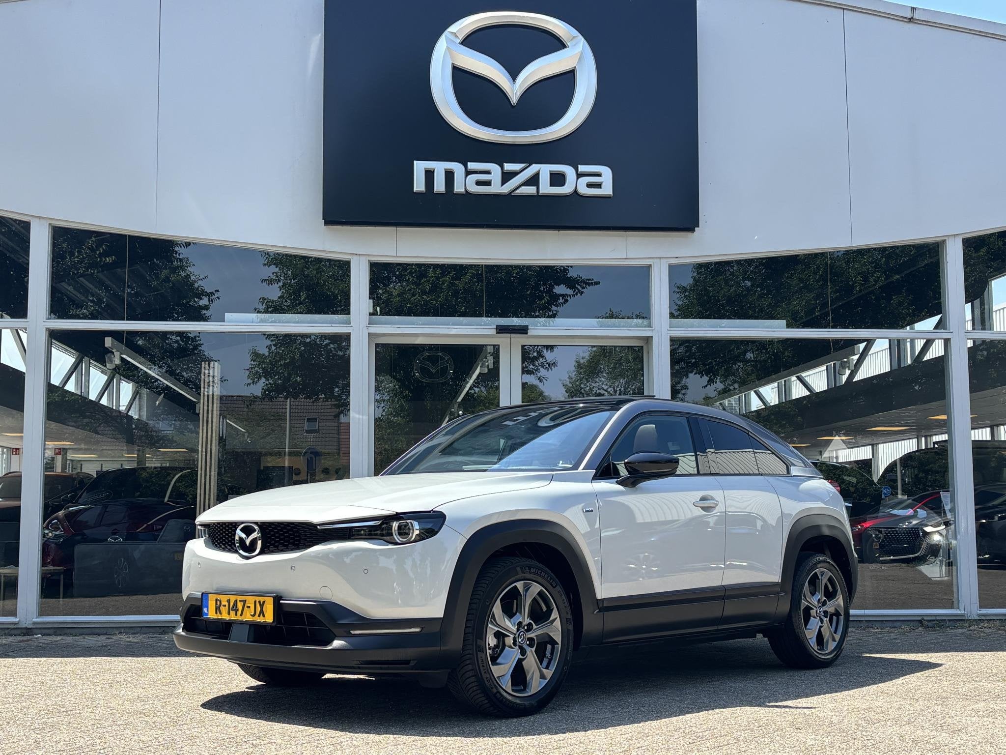 Mazda MX-30 e-SkyActiv EV 145 Makoto 36 kWh 1e Eig NL-Auto D, Auto's, Mazda, Gebruikt, Zwart, 44 min, Leder en Stof
