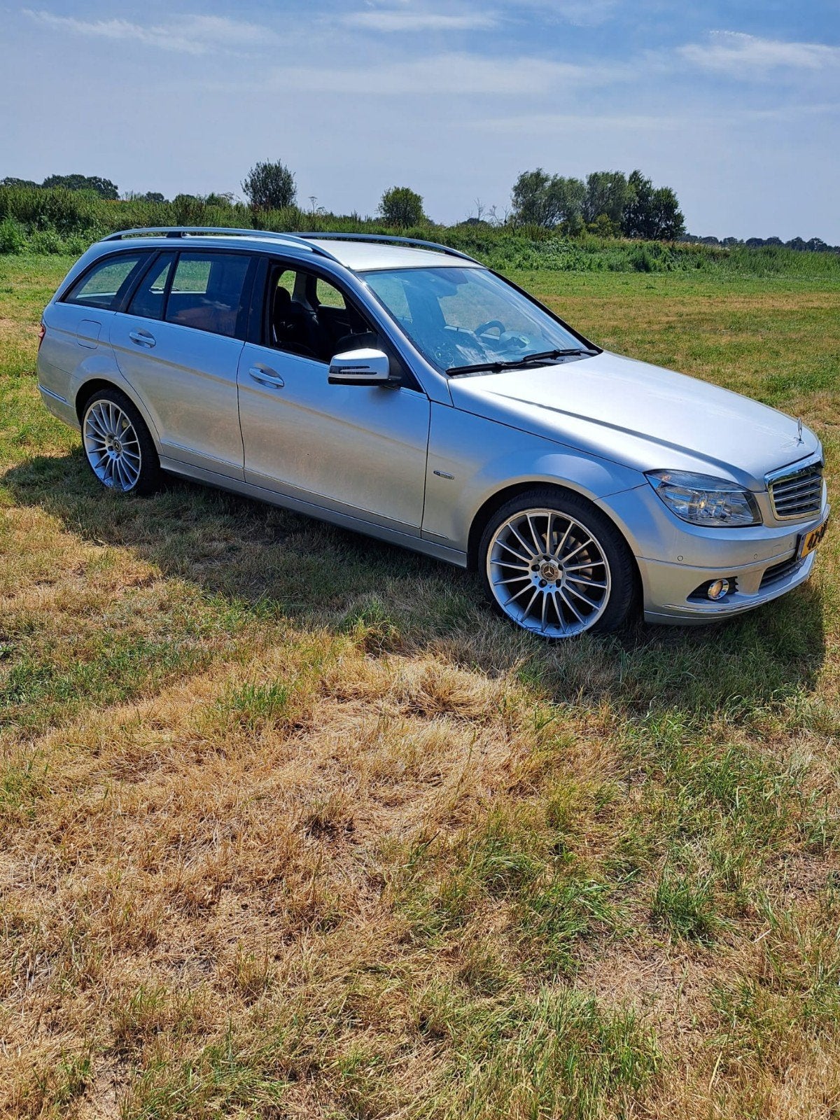 Mercedes-Benz C-Klasse 1.8 C180 CGI Estate AUT 2010 Grijs, Auto's, Automaat, 1800 kg, Zwart, 1796 cc