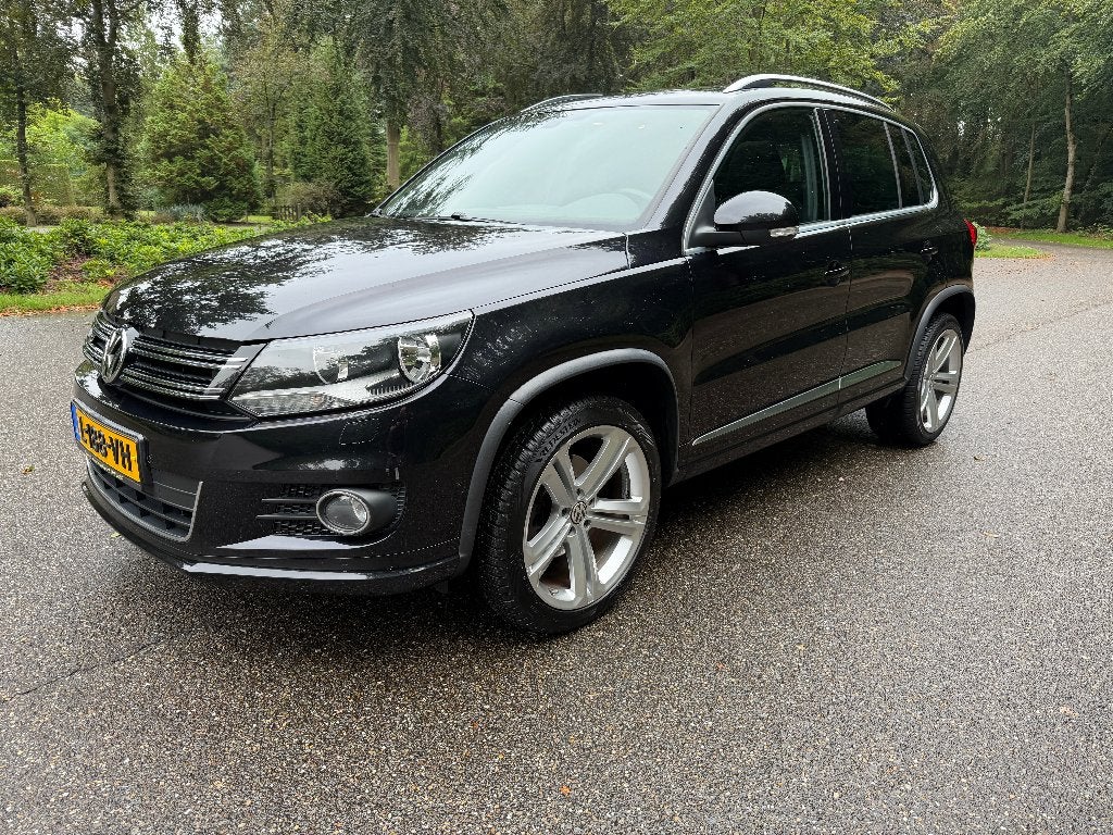 Volkswagen Tiguan 1.4 TSI 160PK 2x R-Line Sport&Style PANO, Auto's, Voorwielaandrijving, Euro 5, 15 km/l, 1800 kg