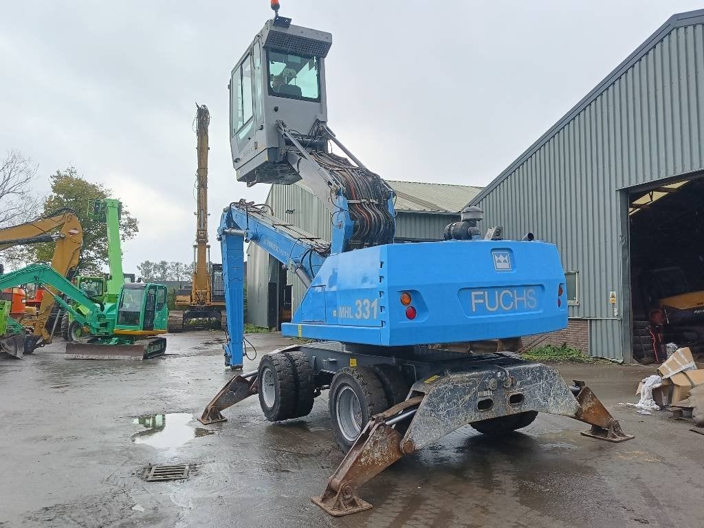 Fuchs MHL 331 waste industry handler 22 ton umslagbagger, Kraan