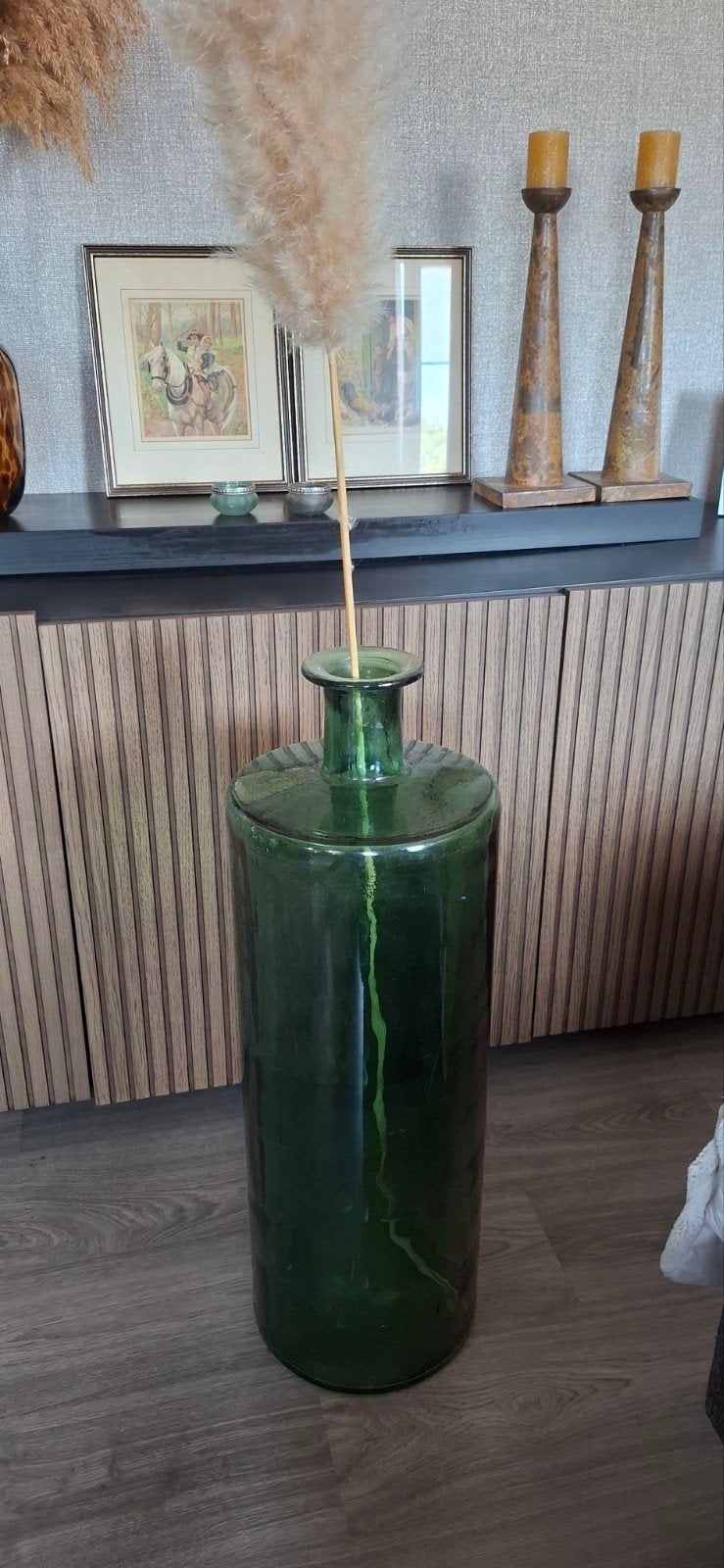 Grote groene glazen vaas, Ophalen
